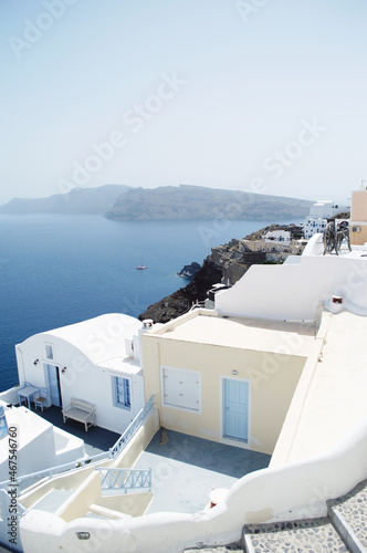 GREECE  SANTORINI  Scenic seaside landscape view of white classics buildings on the rocky slopes of Thira island  