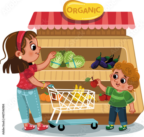 Mother and her son buying organic vegetables and fruits.