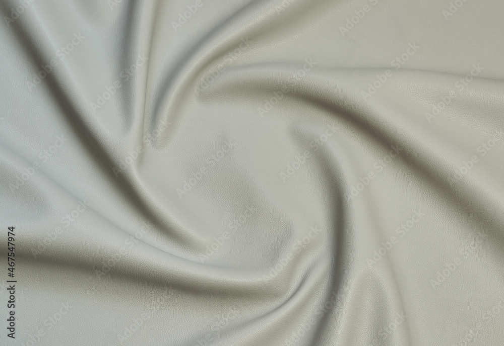 Fototapeta premium beige artificial leather with waves and folds on PVC base