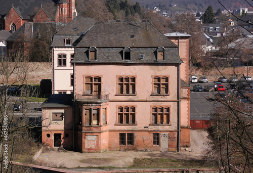 Lost place: an abandoned historical villa facade with oriel windows in the suburb of Trier Ehrang, Germany  photo