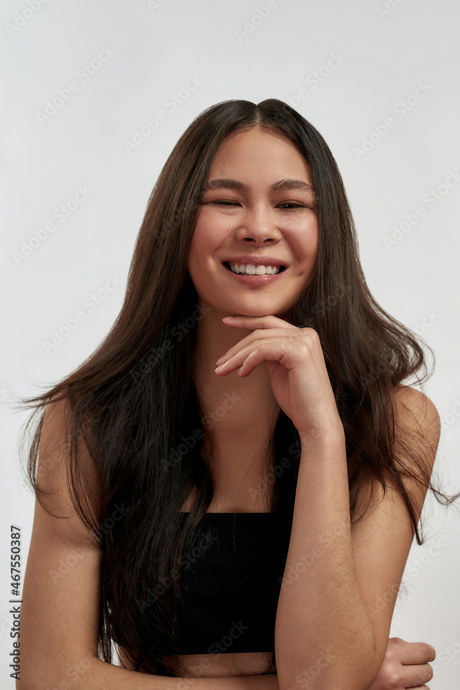 Portrait of smiling Asian girl pose in studio Portrait of smiling Asian girl pose in studio
