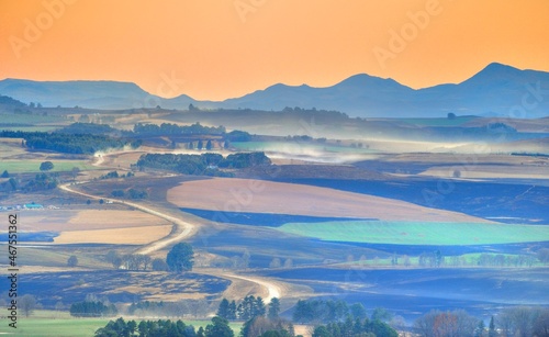 PATCHWORK FIELDS AND COUNTRY ROAD photo