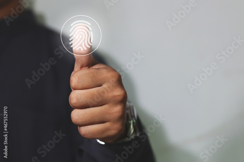 Fingerprint scan provides security access with biometrics identification. Business Technology Safety Internet Concept.