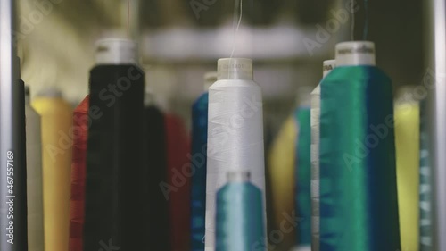 Sewing machine yarn in action colorful yarn and string