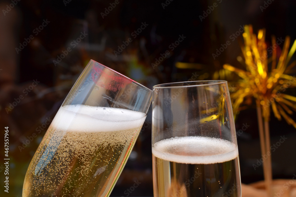 two glasses with champagne clink glasses close up two glasses with champagne clink glasses close up