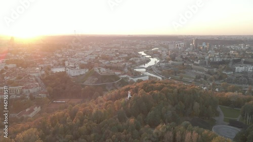 Aerial view of Vilnius city centre with hils and green nature around.  