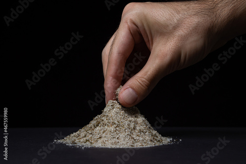 Foto Salt mixed with spices on a black background