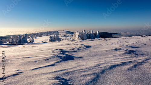 Smooth glittering snow at mountain ridge. photo