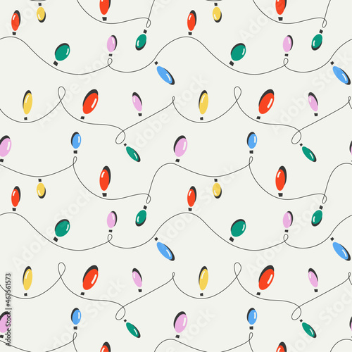 Christmas lights on a light background. Seamless pattern. 