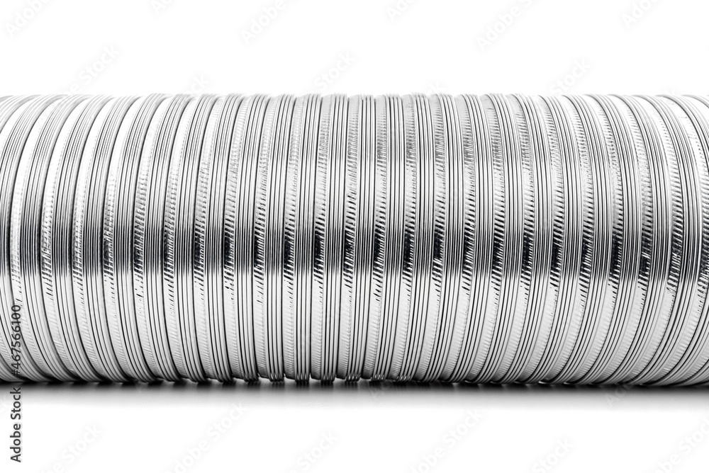 Flexible corrugated aluminum tube, resistant to high temperatures, isolated on a white background. Flexible corrugated aluminum tube, resistant to high temperatures, isolated on a white background.