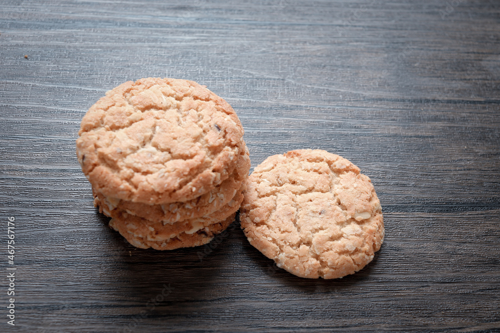 Delicious oatmeal cookies on dark wooden table. Delicious oatmeal cookies on dark wooden table.