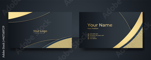 Modern Business Card - Creative and Clean Business Card Template. Luxury business card design template. Elegant dark back background with abstract golden wavy shapes lines shiny. Vector illustration