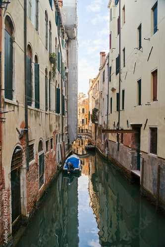 Venice, Italy - 10.12.2021: Traditional canal street with gondolas and boats in Venice, Italy. © Dima Anikin