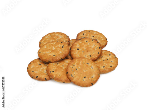 Many delicious crackers on white background, top view
