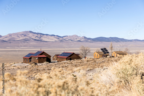Desert landscape near Berlin ghost town in Nevada with park buildings in the foreground