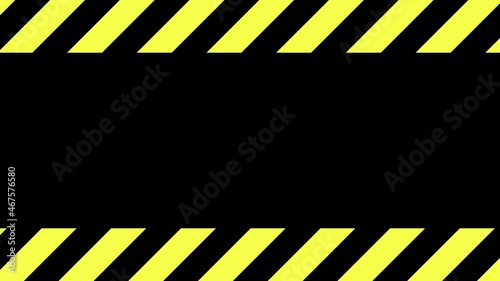 A scrolling warning caution tape (angled stripes). Black background, medium motion.
 photo