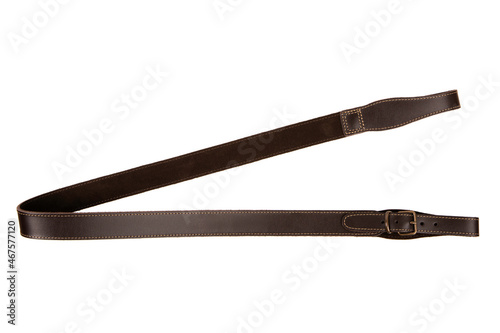 Foto Brown leather shoulder strap for a gun isolated on white back