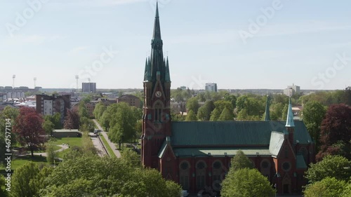 Orbital shot of St Matteus kyrka protestant church facade in norrköping Sweden photo