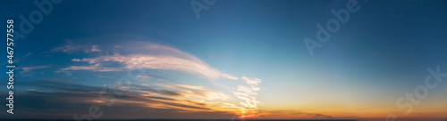 Fototapeta Naklejka Na Ścianę i Meble -  Sunset. Blue sky and orange sun.