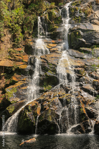 Man swimming in waterfall, Serra da Canastra, Minas Gerais, Brazil