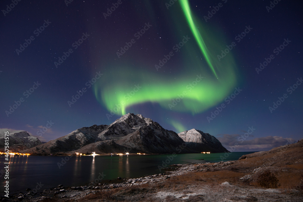 Aurora Borealis, the Northern lights on sky in Lofoten islands, northern Norway