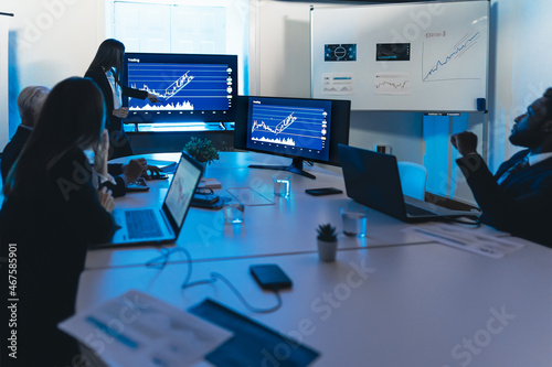Obraz na plátně Business traders people in meeting room working on crypto currency markets with