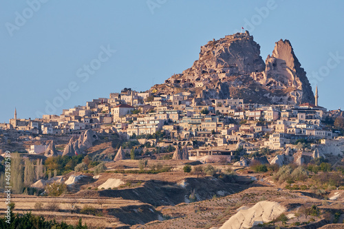 Traveling in Turkey. Beautiful landscape of Cappadocia town with caves, mountains and houses.