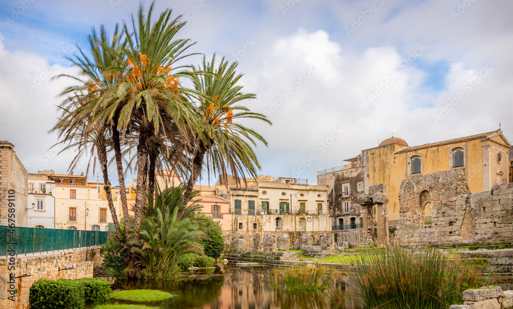 Fototapeta premium Daytime View of the Ruins of the Ancient Greek Temple of Apollo on Ortygia Island in Syracuse, Sicily, Italy - UNESCO World Heritage