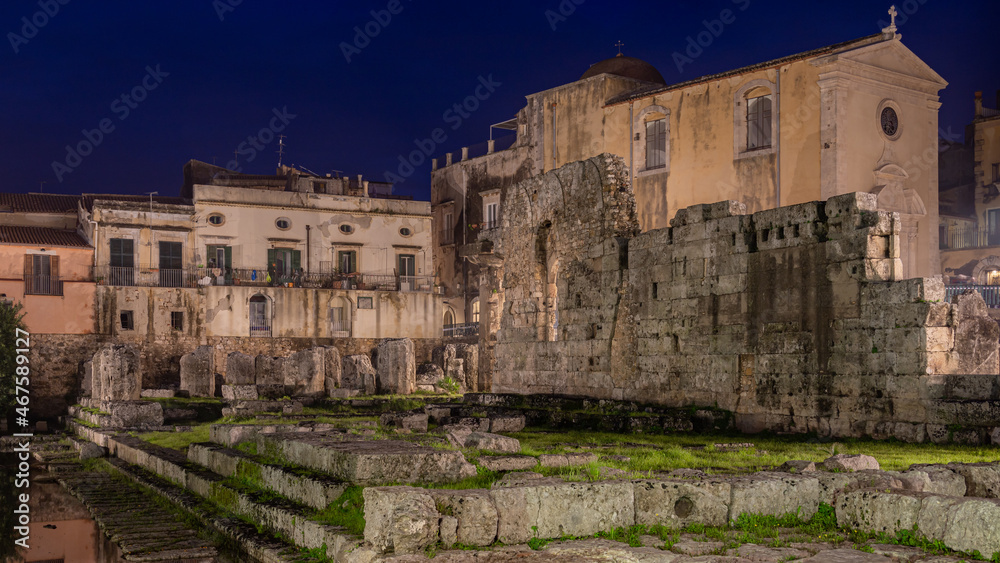 Evening View of the Ruins of the Ancient Greek Temple of Apollo on Ortygia Island in Syracuse, Sicily, Italy - UNESCO World Heritage