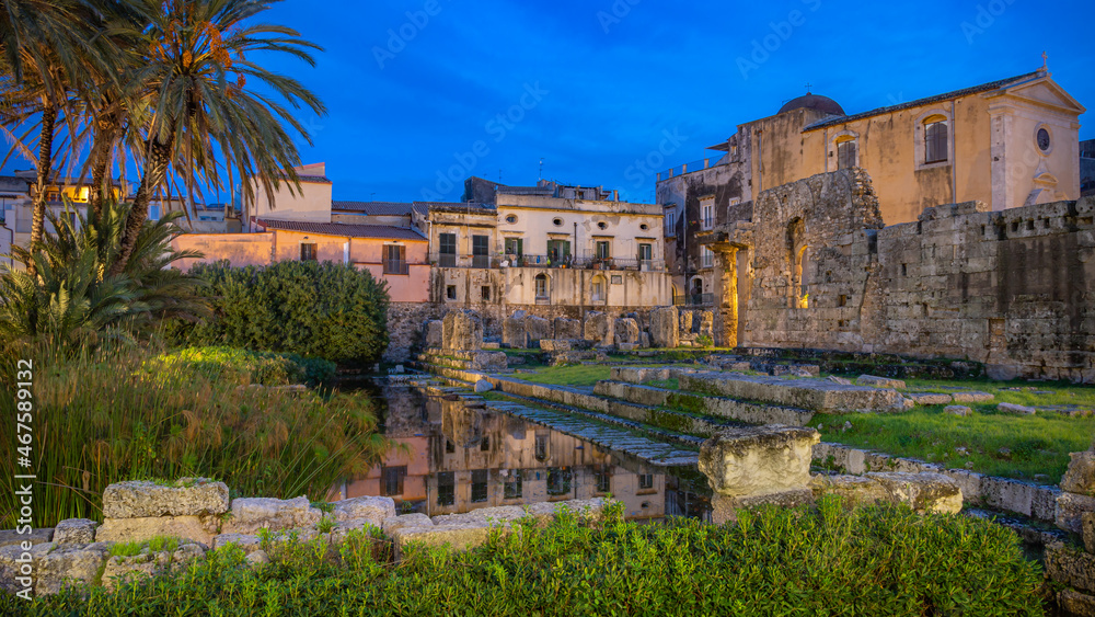 Evening View of the Ruins of the Ancient Greek Temple of Apollo on Ortygia Island in Syracuse, Sicily, Italy - UNESCO World Heritage