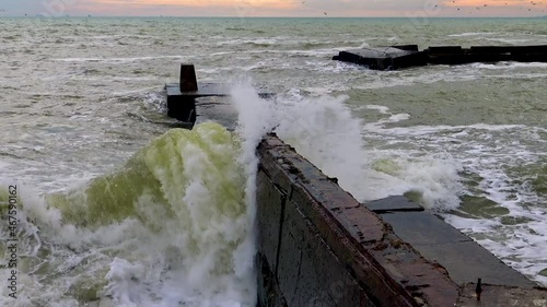 Dirty foam in the eutrophied sea during a storm, ecology of the reservoir, Black Sea photo