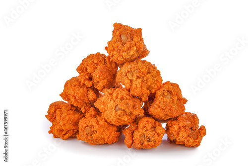 Heap of fried spicy chicken isolated on white background.