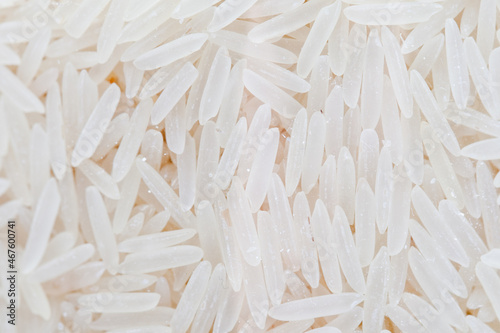 Basmati rice in a transparent macro jar. Useful cereal, oriental cuisine, recipes, healthy food