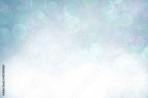 Blue holiday background. Christmas background with bokeh snowflake and stars photo