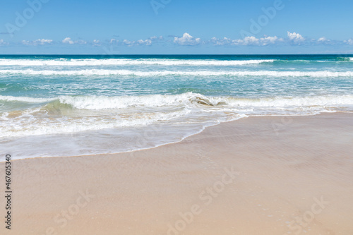 Waves and sand on the beach