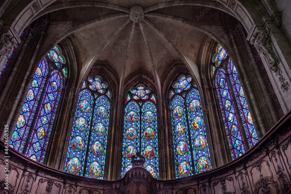 Religious stained glass window inside the cathedral of Verdun in France
