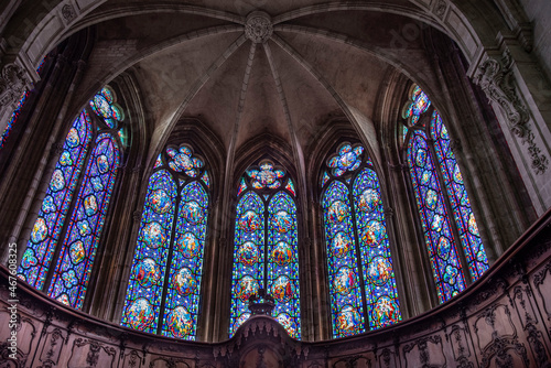 Religious stained glass window inside the cathedral of Verdun in France 