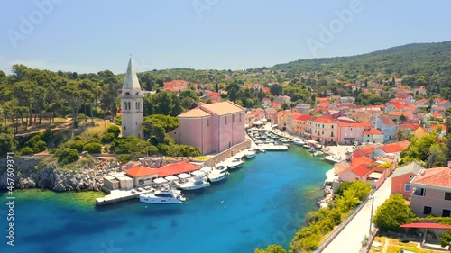 Shooting from a drone of the azure bay in town Veli Losinj on a sunny day. Croatia. Filmed in 4k, drone video.