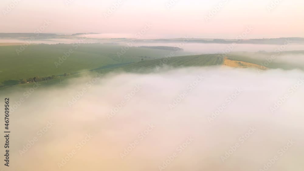 Shooting from a drone of a foggy agricultural lands. Filmed in 4k, drone video. Shooting from a drone of a foggy agricultural lands. Filmed in 4k, drone video.
