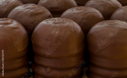 Delicate whipped cream, covered with the finest chocolate crust photo