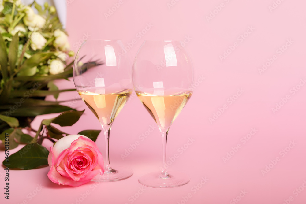 Romantic lovely holiday card with flowers and 2 glasses of italian white wine on pink background. Romantic atmosphere for people in love. Beautiful wedding day postcard. Romantic lovely holiday card with flowers and 2 glasses of italian white wine on pink background. Romantic atmosphere for people in love. Beautiful wedding day postcard.