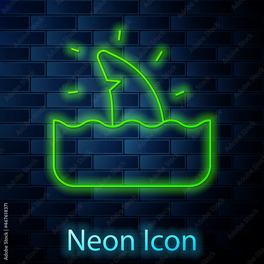 Glowing neon line Shark fin in ocean wave icon isolated on brick wall background. Vector Glowing neon line Shark fin in ocean wave icon isolated on brick wall background. Vector