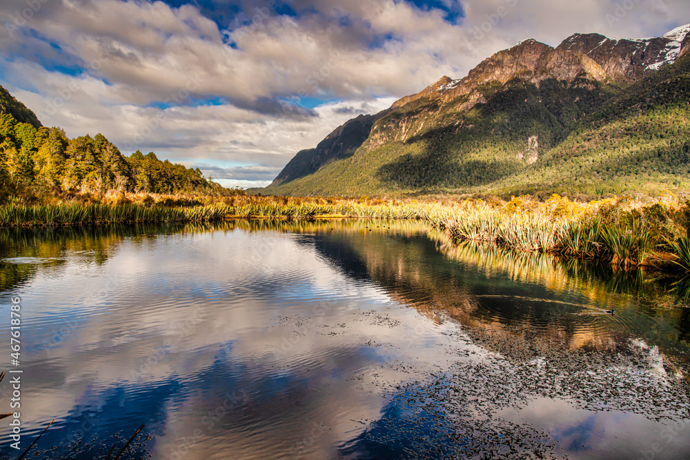 Mirror Lakes are a set of lakes lying north of Lake Te Anau and on the road from Te Anau to Milford Sound in New Zealand where the most amazing reflections are captured on the calm water