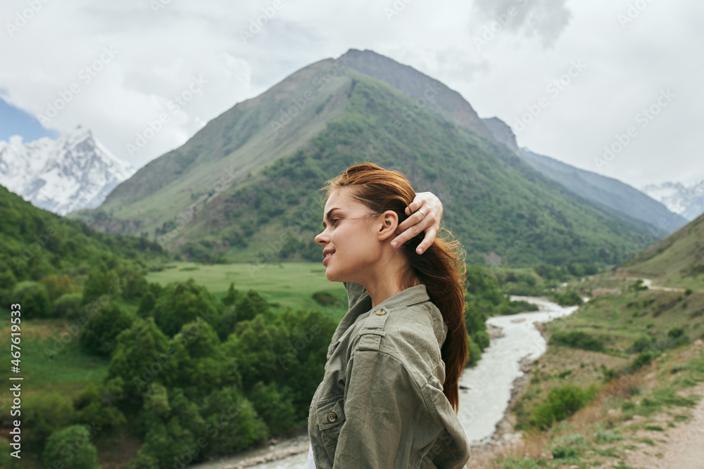 woman outdoors in the mountains landscape fresh air