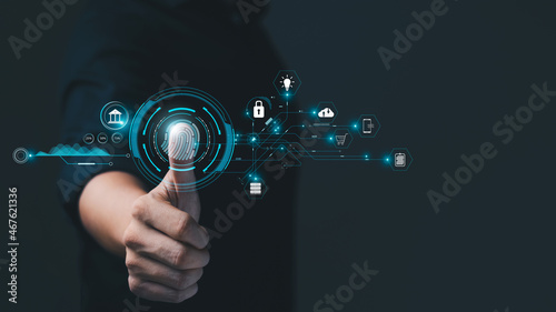 Concept of cyber security digital technology, business people use fingerprints to access personal cybersecurity, keeping users' personal information safe, secure internet access