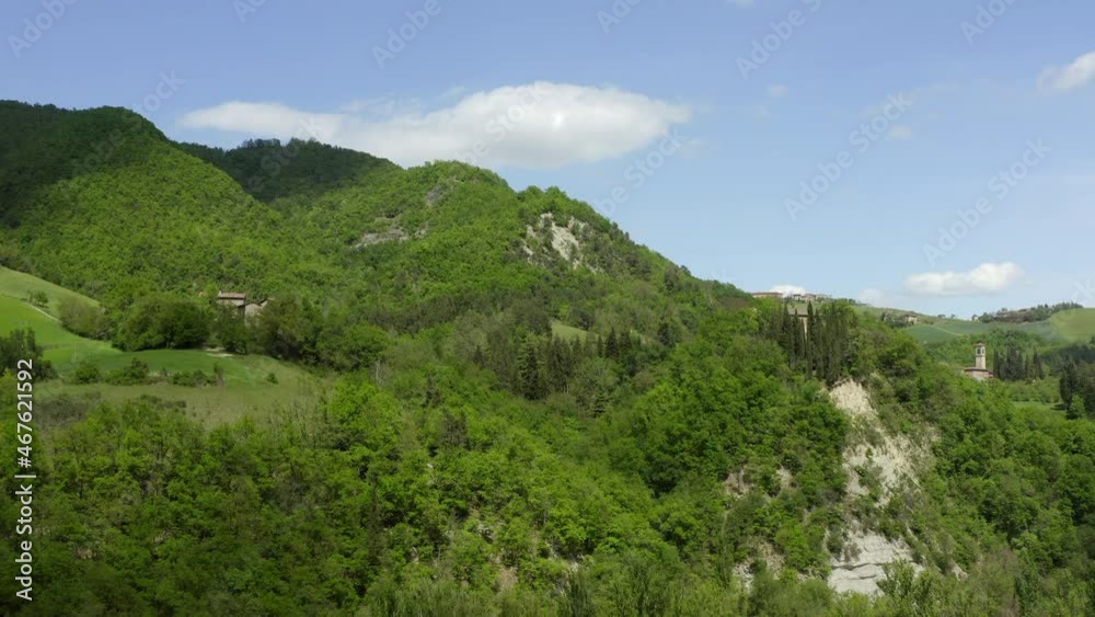 Aerial Beautiful View Of Built Structures On Hills, Drone Flying Over Green Trees - Apennine Mountains, Italy Aerial Beautiful View Of Built Structures On Hills, Drone Flying Over Green Trees - Apennine Mountains, Italy