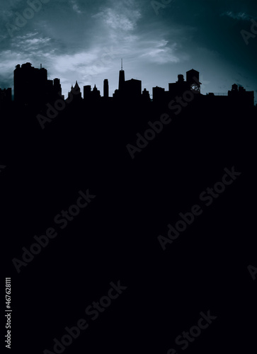 Silhouettes of New York City skyline buildings with dark swirling storm clouds overhead and empty space