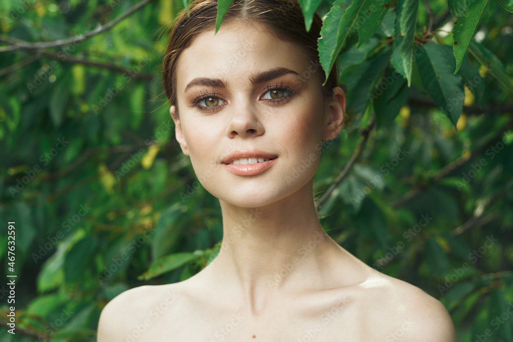 smiling woman skin care bare shoulders green leaves nature Lifestyle smiling woman skin care bare shoulders green leaves nature Lifestyle