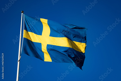 Photography Swedish flag on the sky background