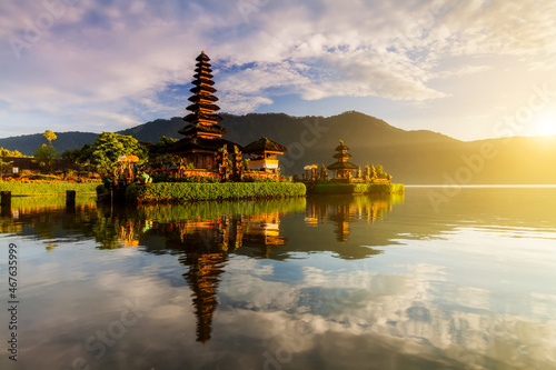 Pura Ulun Danu Bratan temple in Bali island. Hindu temple at sunrise s on Beratan lake, Indonesia photo